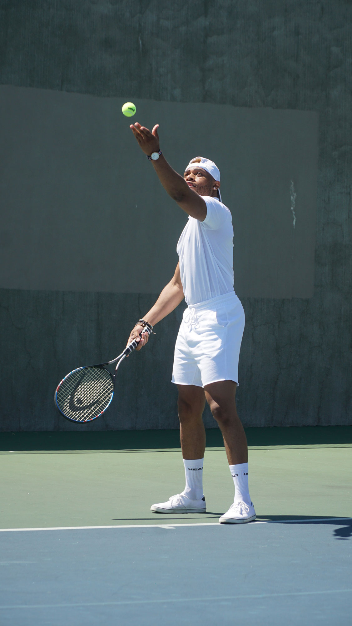 man serving in tennis
