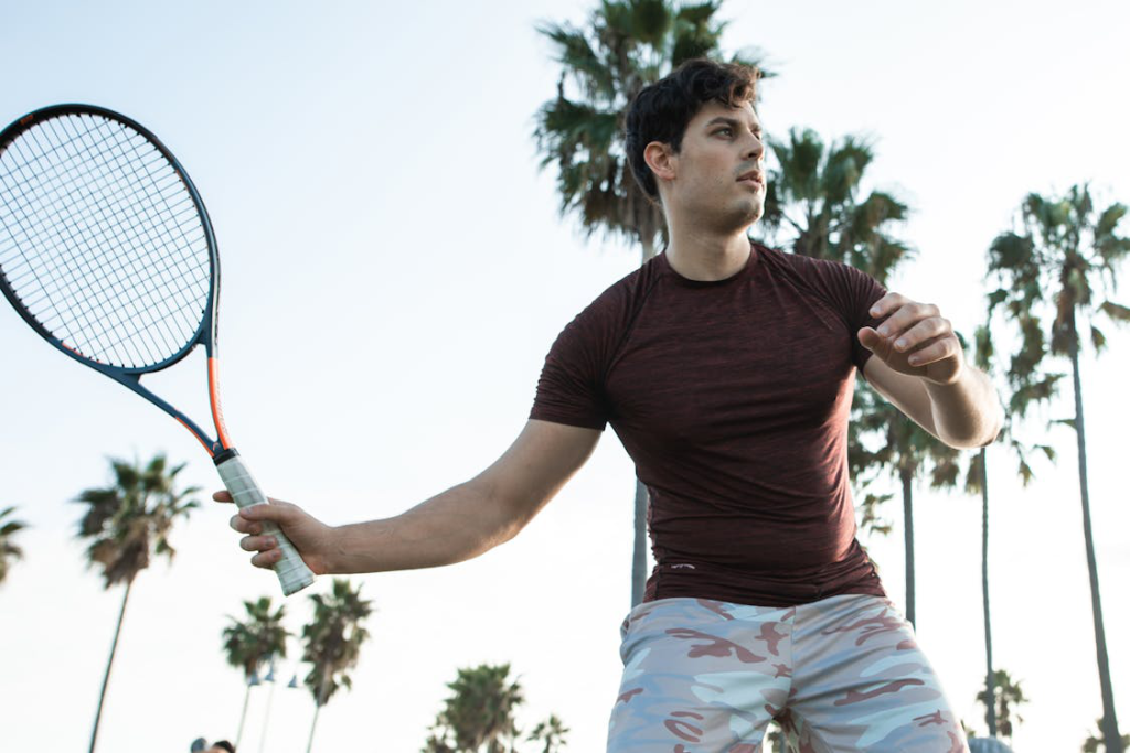 Man playing a tennis match